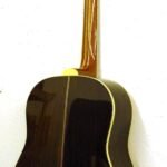 Indian rosewood back Indian Rosewood back and sides. 5 ply neck for supreme stiffness. Heavily flamed maple adjoin the rosewood center strip.