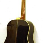 Indian rosewood back Indian Rosewood back and sides. 5 ply neck for supreme stiffness. Heavily flamed maple adjoin the rosewood center strip.