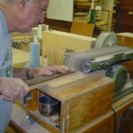 Sanding top of "Fender" headstock