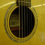 Indian Ship Soundhole decoration. Note the inside of the soundhole is sealed with a strip of rosewood to protect the top from moisture.