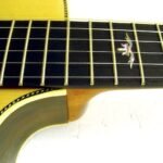 Fretboard | A delicate inlay at the 12th fret.