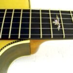 Fretboard | A delicate inlay at the 12th fret.