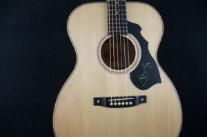 Jerry's signature in the pickguard.